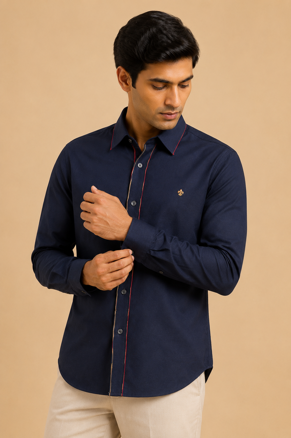 Navy shirt with contrast piping and embroidered crest in cotton